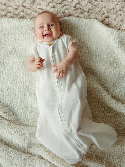 baby wearing muslin sleep sack