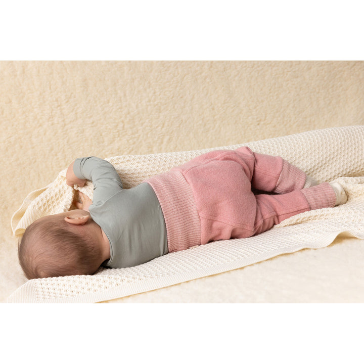 Disana boiled wool pants back view on baby