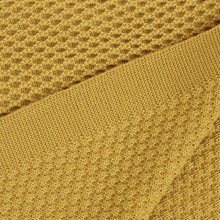 closeup of disana merino wool curry yellow