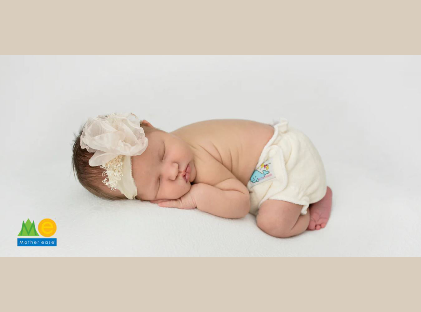 sleeping baby in a cotton cloth diaper