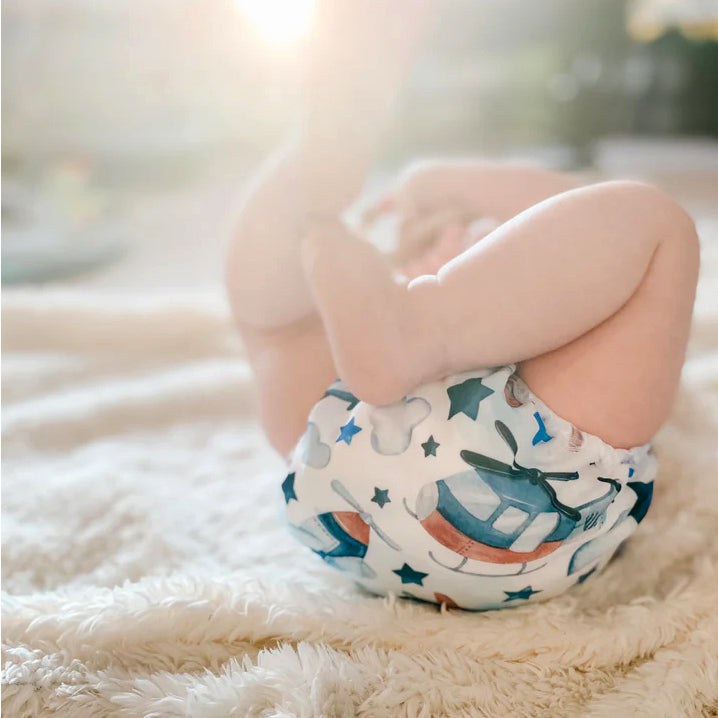 Mother-ease cloth diaper on a baby cute toes
