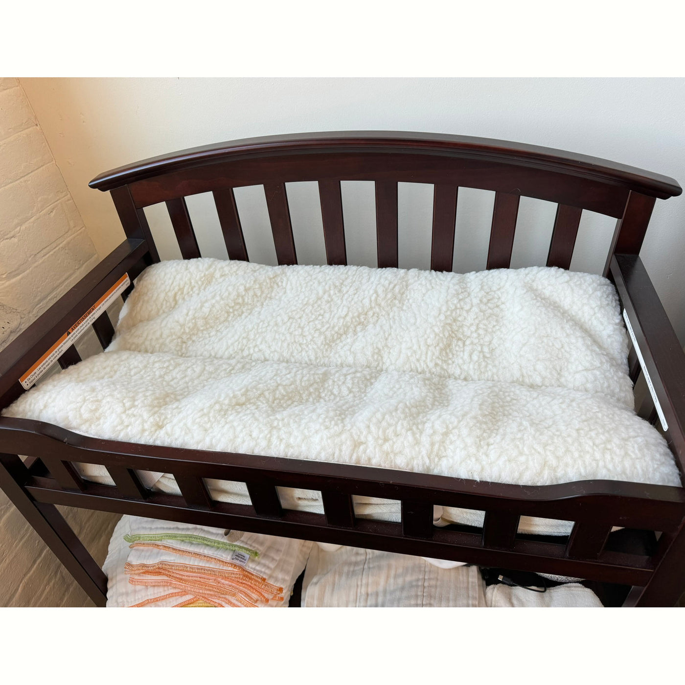 wool topper on changing table