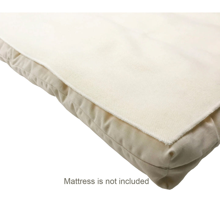 Wool mattress protector on a mattress