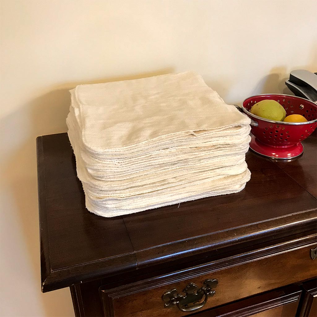 stack of 48 paper towel alternative cloths in kitchen