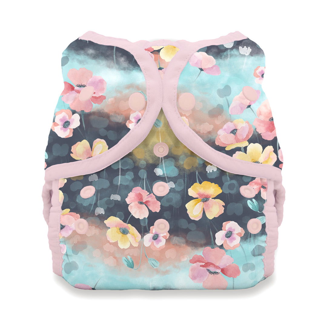 Thirsties Duo Wrap Snap cloth diaper cover Poppy Floral-patterned diaper cover with pink trim on a white background