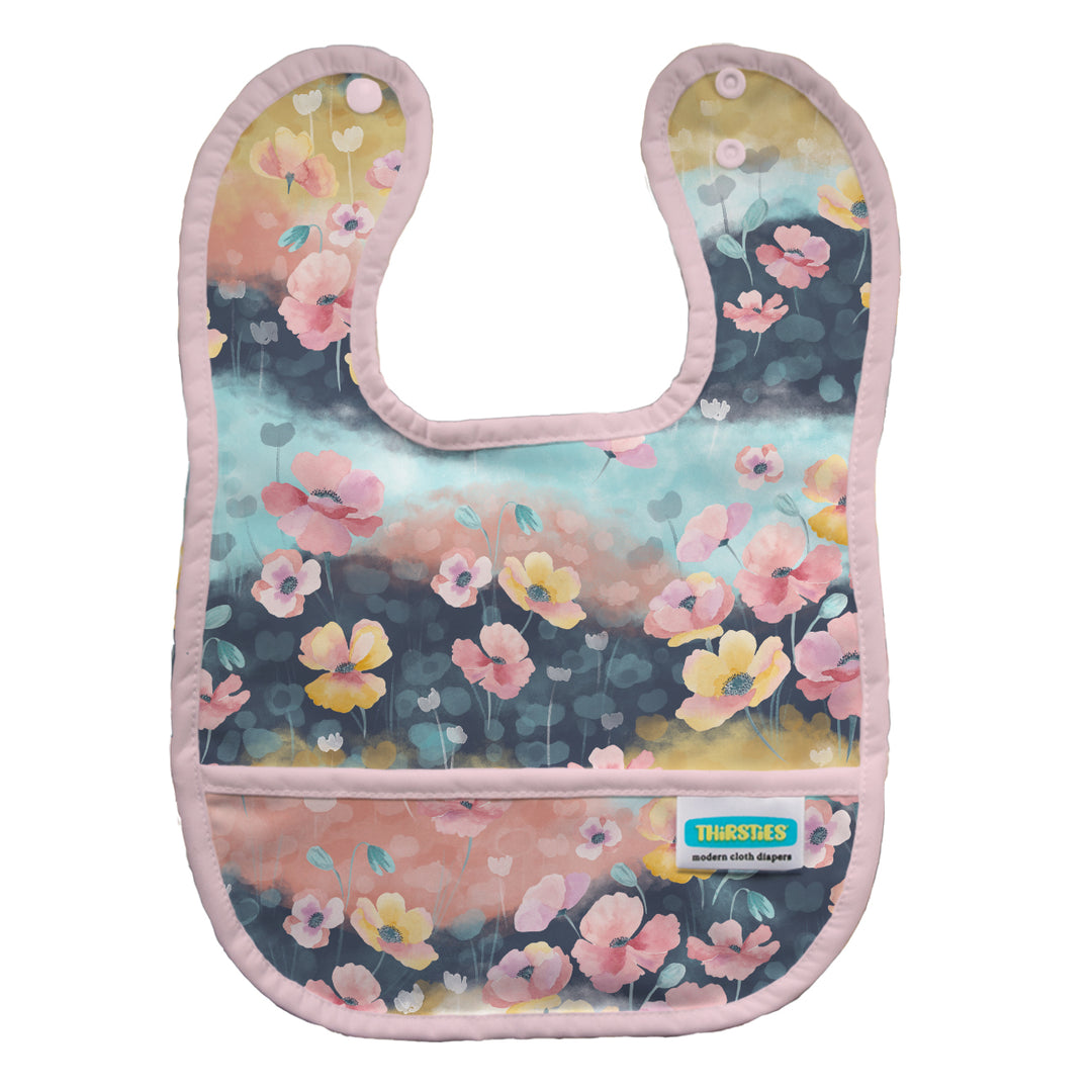 Poppy Floral-patterned baby bib with pink trim snap