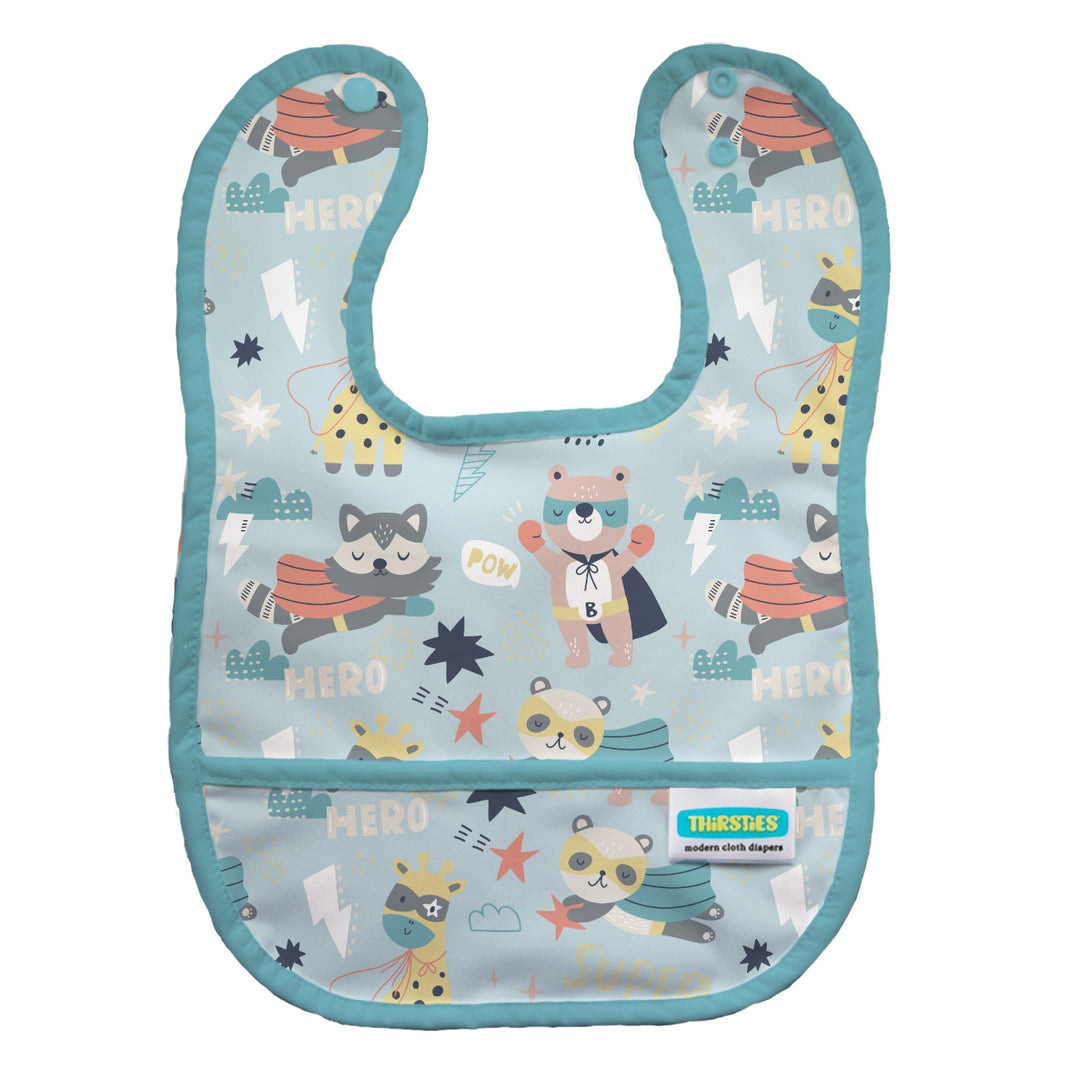 Baby bib with superhero-themed design on a light blue background