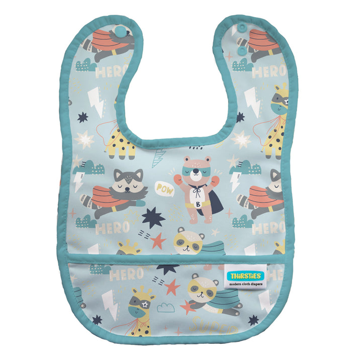 Baby bib with superhero-themed design on a light blue background