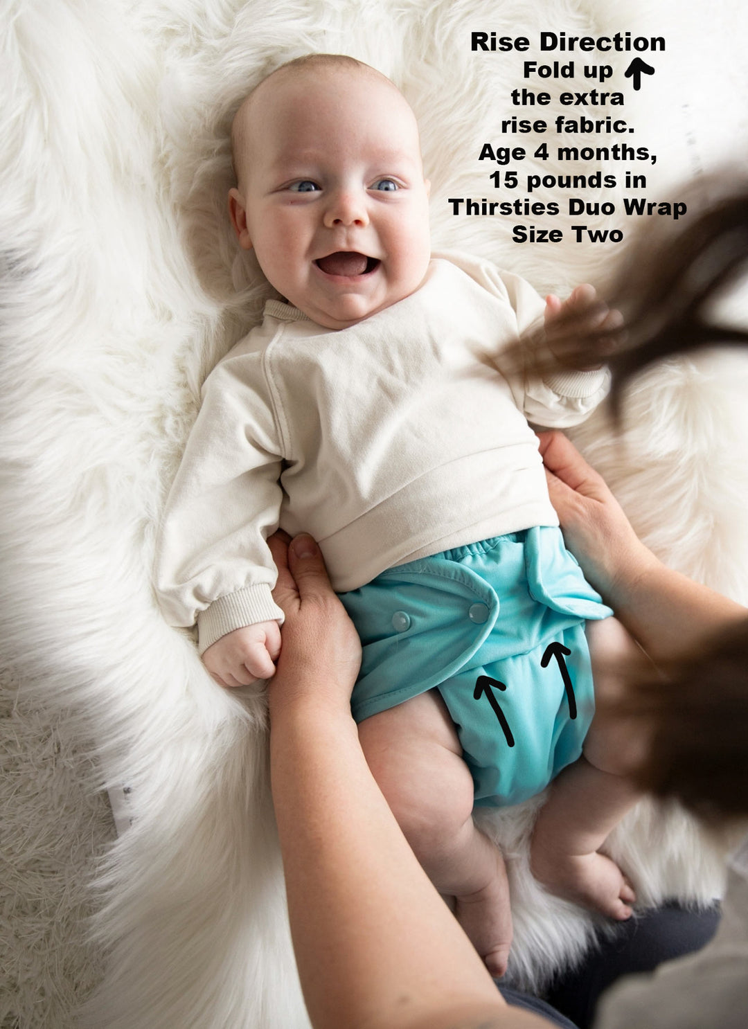 How to use Thirsties Duo Wraps Rise direction information shown on a baby