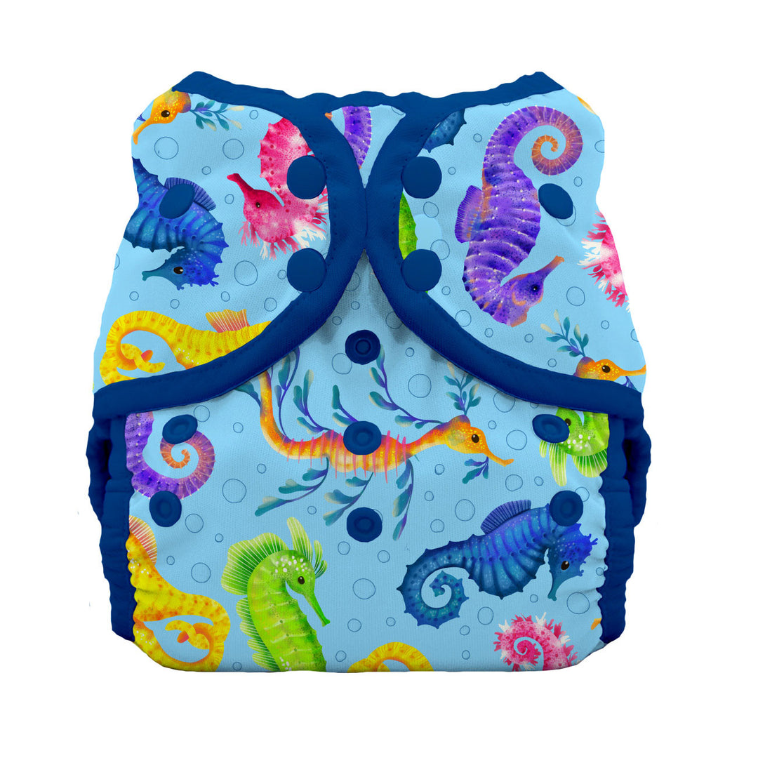 Colorful seahorse-patterned swim diaper on a white background