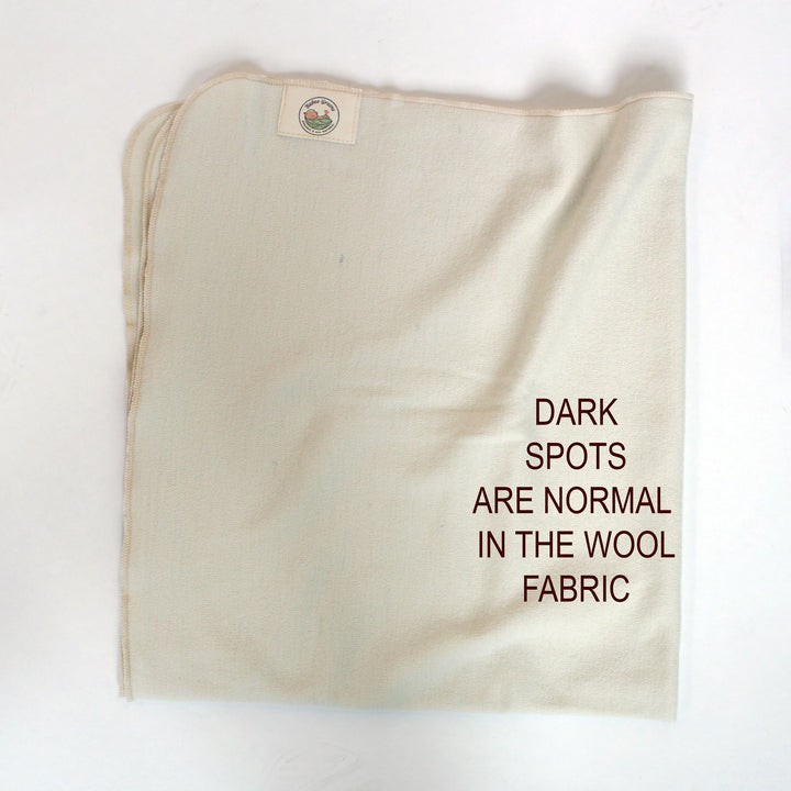dark spots on wool is normal for the wool fabric babee greens wool swaddle blanket
