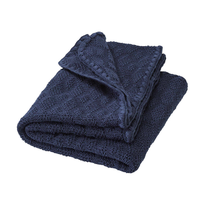 Folded sDisana babydecke fancy knit organic heirloom baby blanket indigo navy blue