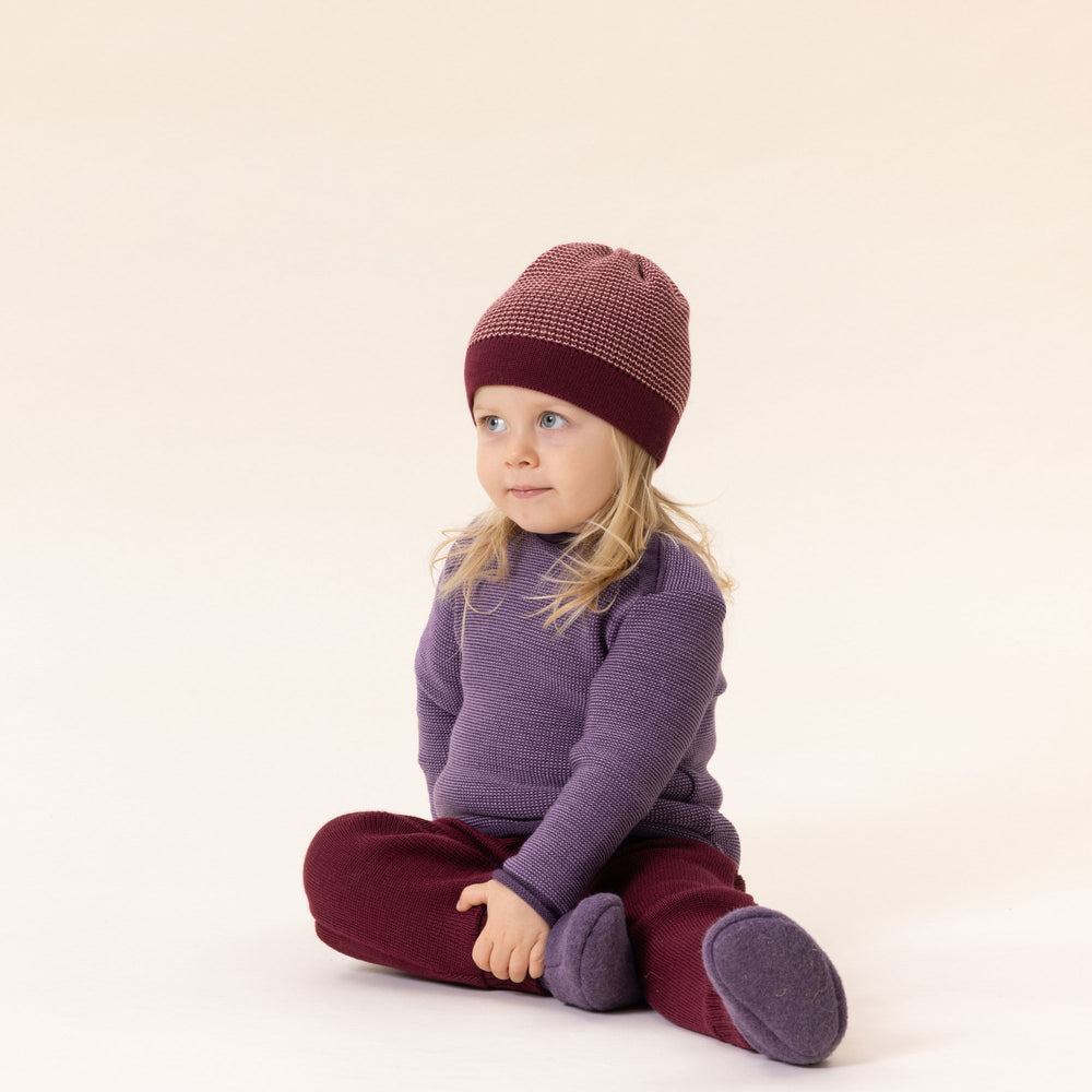 toddler wearing wool Disana beanie hat