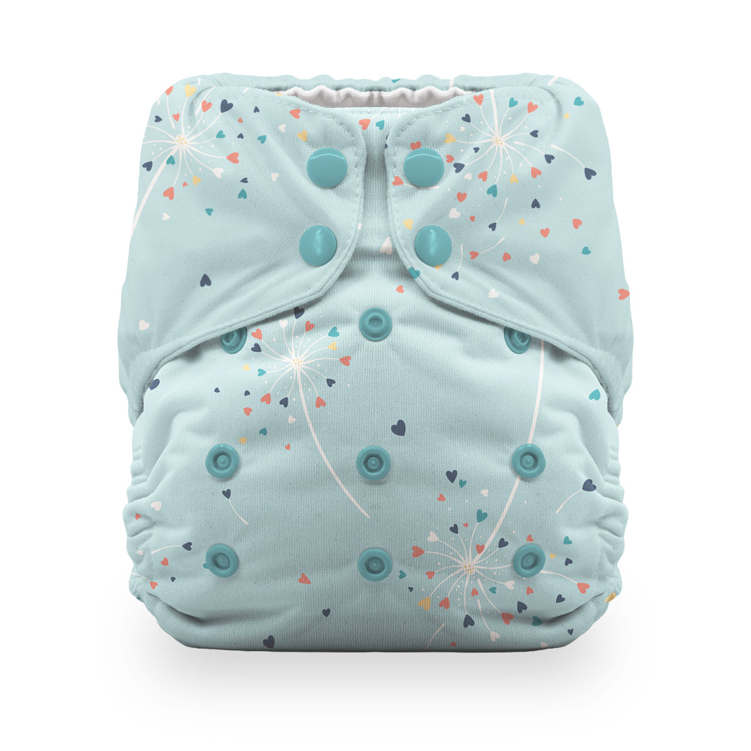 Thirsties light blue reusable cloth diaper with a dandelion and heart pattern, featuring teal snap closures Blowing Kisses print