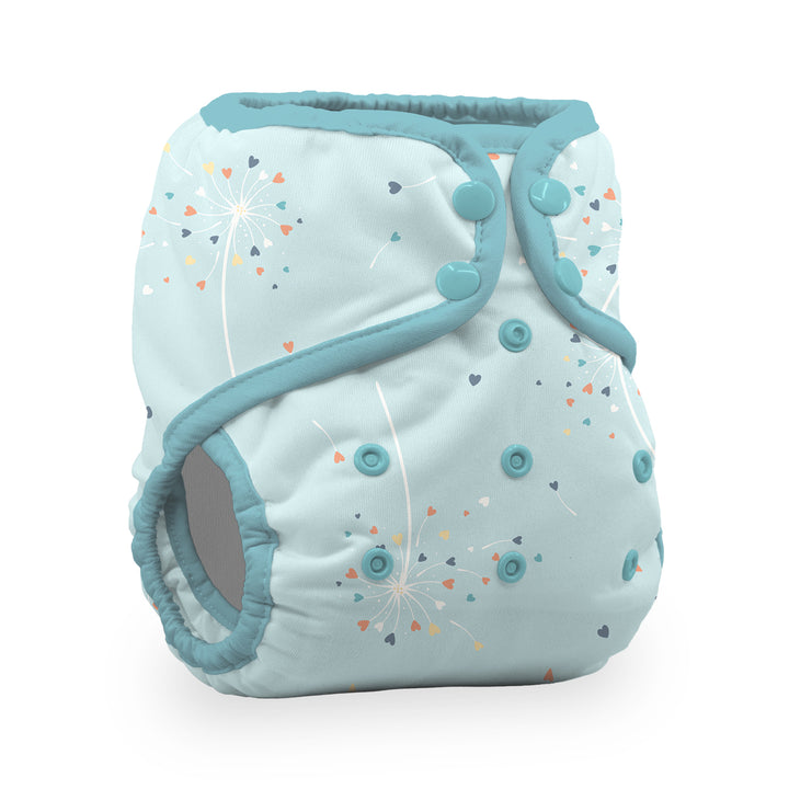 A light blue reusable cloth diaper with a dandelion and heart pattern, featuring teal trim and snap closures Thirsties natural cotton pocket diaper Blowing Kisses print