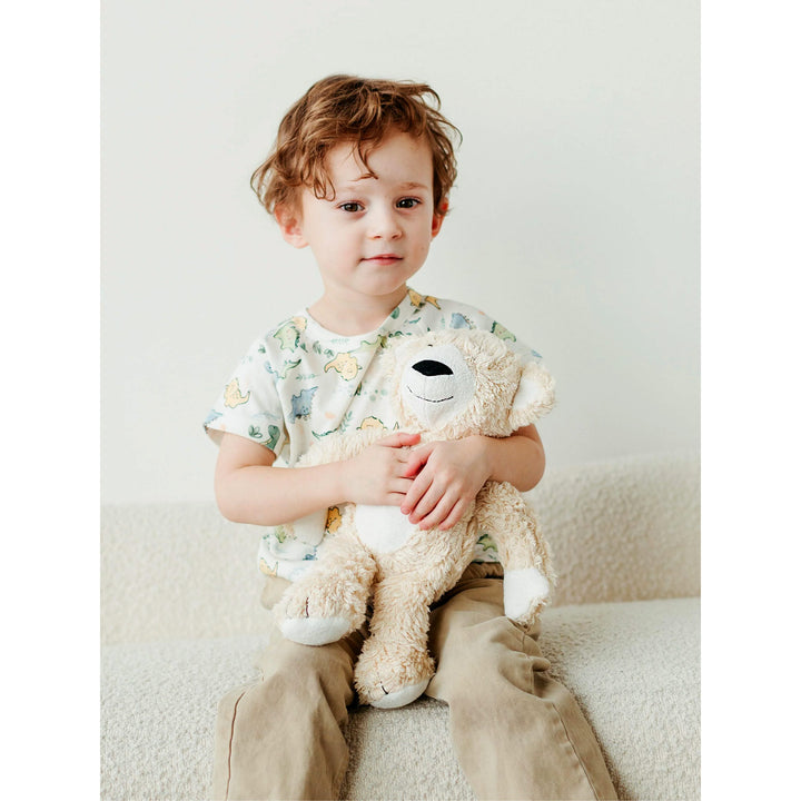 boy holding bon bon the bear organic cotton bear toy