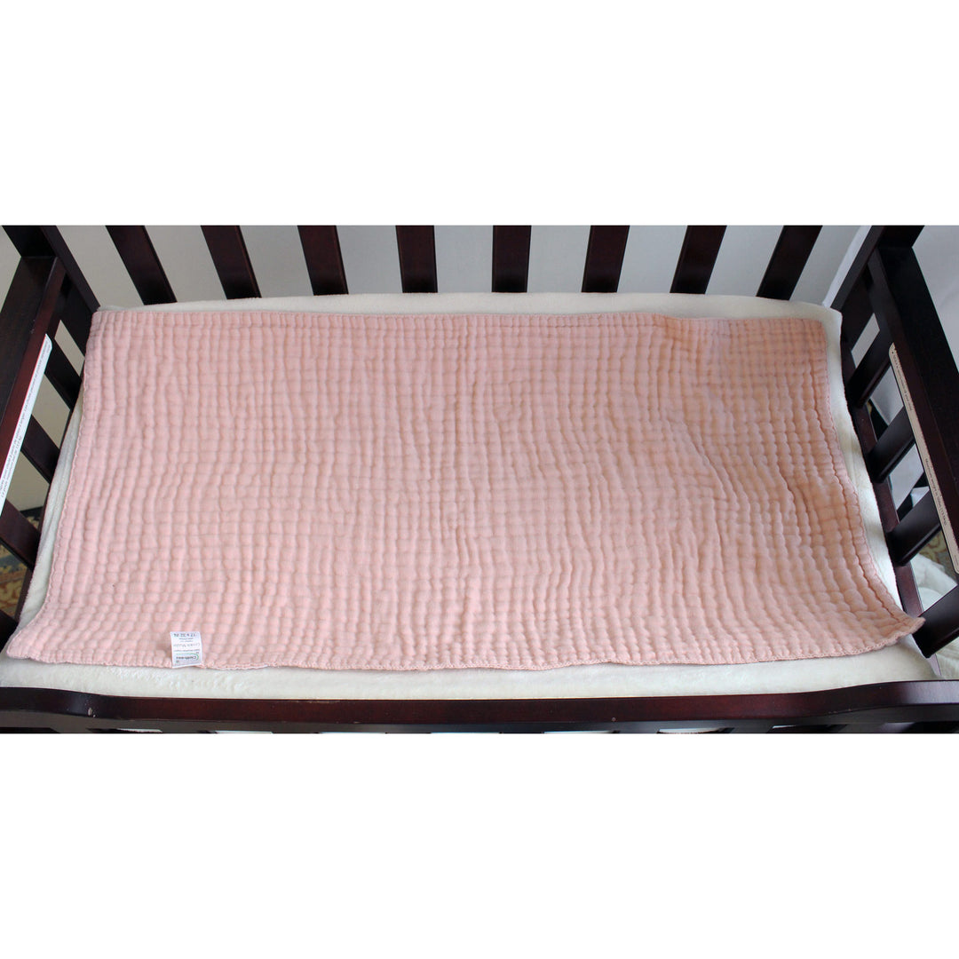 Crinkle muslin organic baby changing cloth cover pad that fits a changing table salmon pink