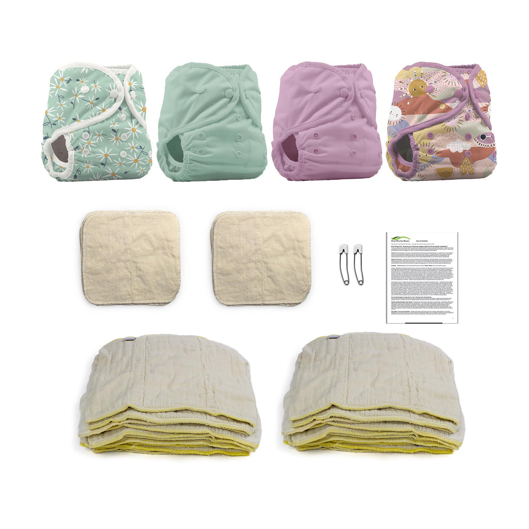 cloth diaper kit for an infant with girl color diaper covers and prefolds and wipes