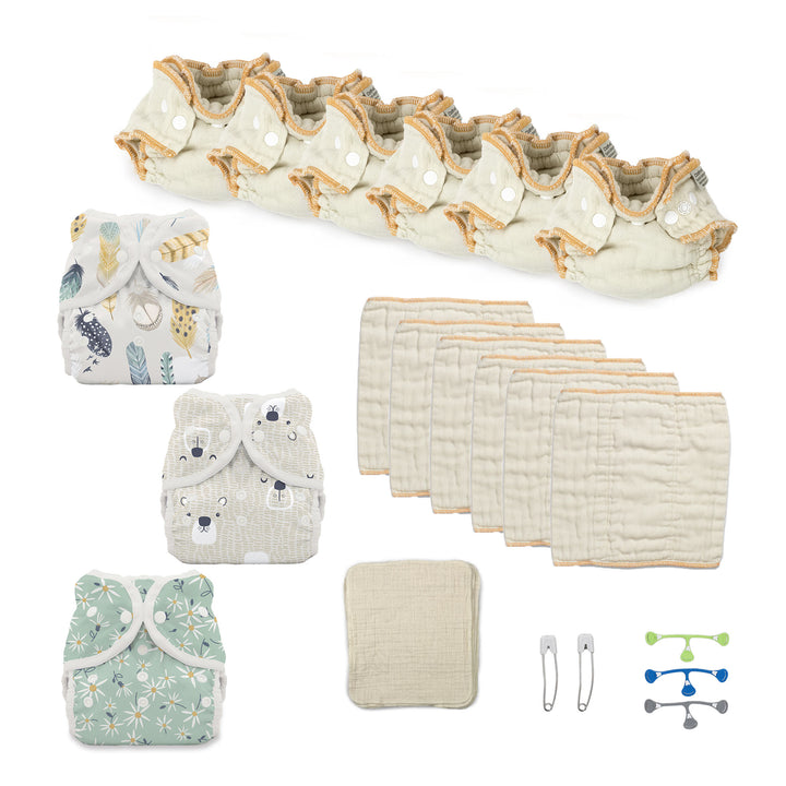 newborn cloth diaper kit with diaper covers and blue snappi fastener girl