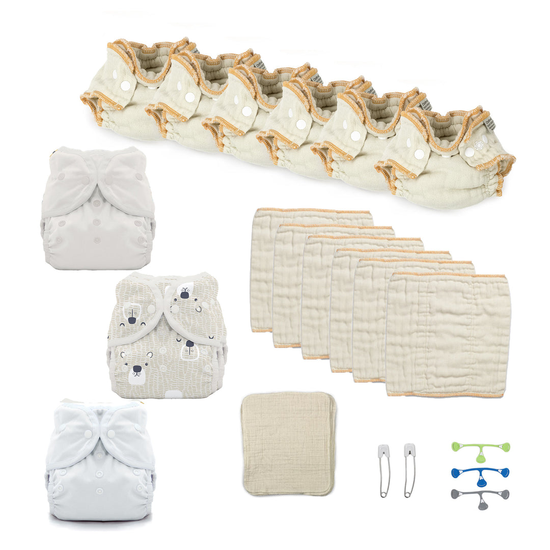 newborn cloth diaper kit with diaper covers and blue snappi fastener