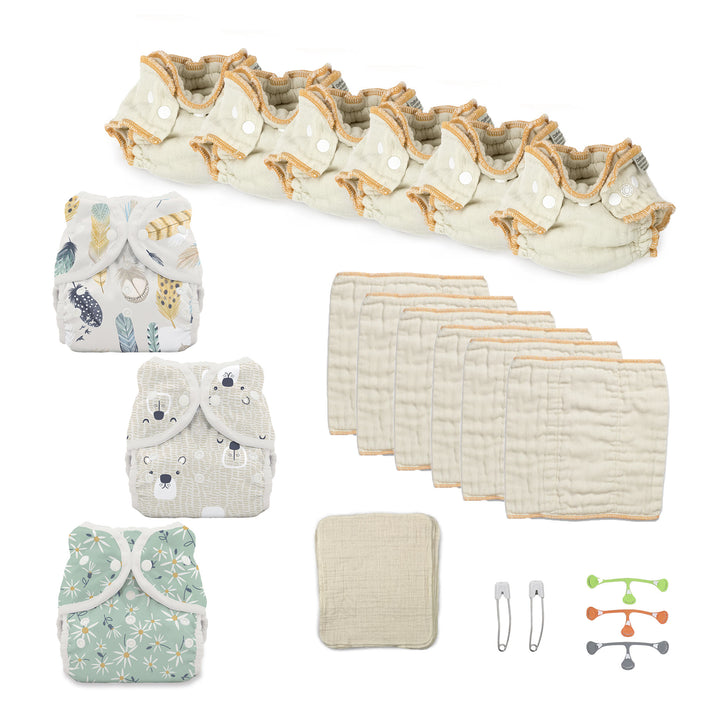Newborn try both cloth diapers kit with fitteds and prefolds and diaper covers for a girl prints