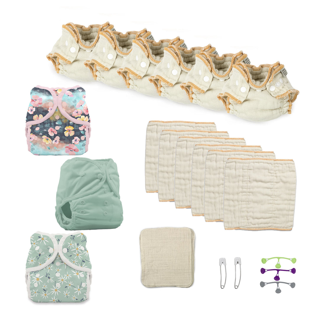 Newborn try both cloth diapers kit with fitteds and prefolds for a girl flower prints