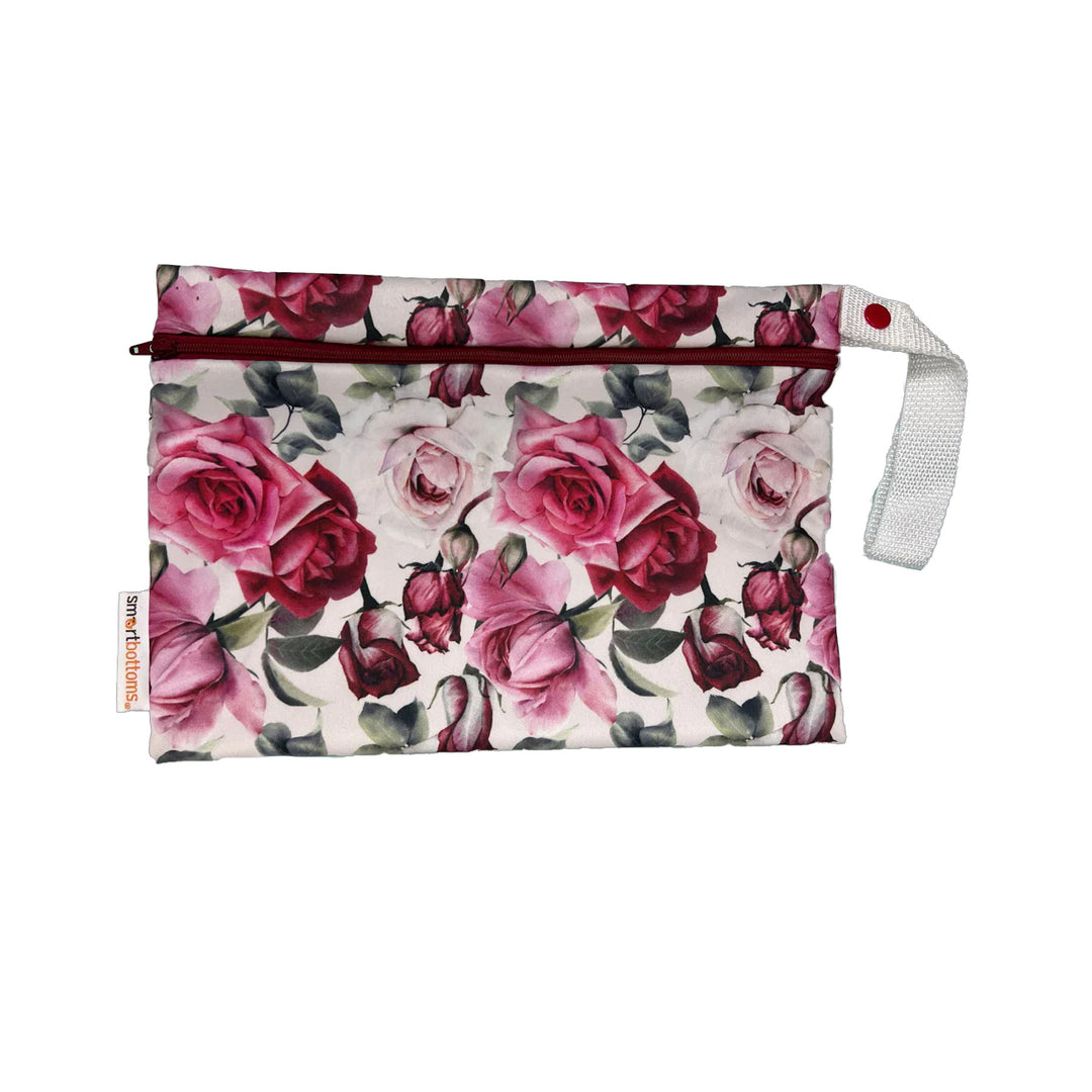 Floral-patterned cloth diaper wipes bag with a red zipper on a white background Moira