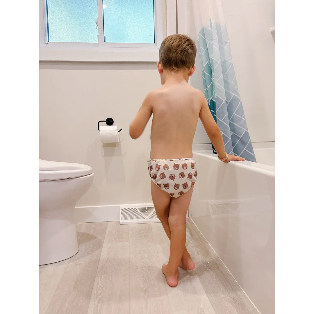 Toddler in a Mother-ease training pant bear print