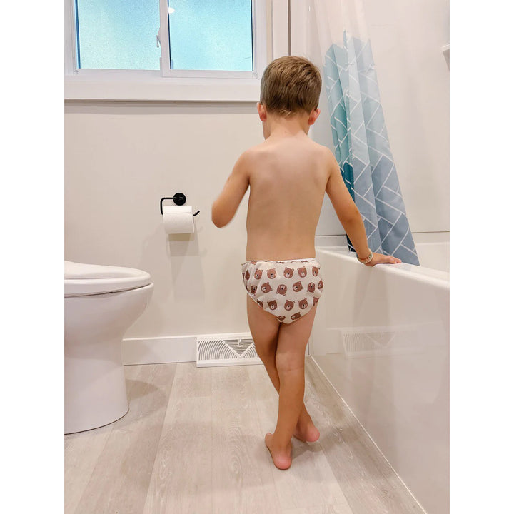 Toddler in a Mother-ease training pant bear print