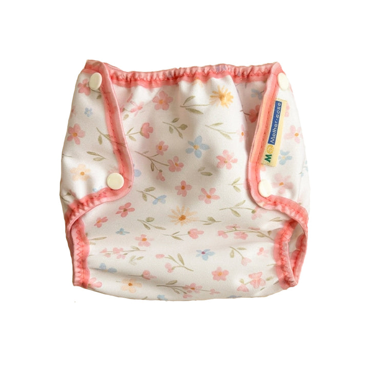 Floral-patterned Wildflower Mother-ease diaper cover with pink trim 