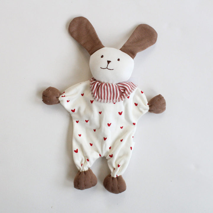 Under the nile stuffed toy puppy with red hearts