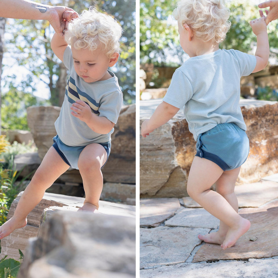 Toddler in slate blue Thirsties potty training pant
