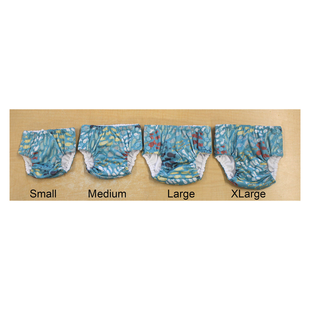 Size comparison of Thirsties swim diapers in 4 sizes Schooling print