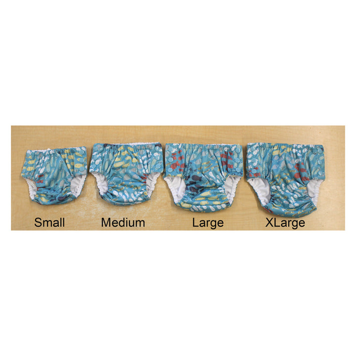 Size comparison of Thirsties swim diapers in 4 sizes Schooling print