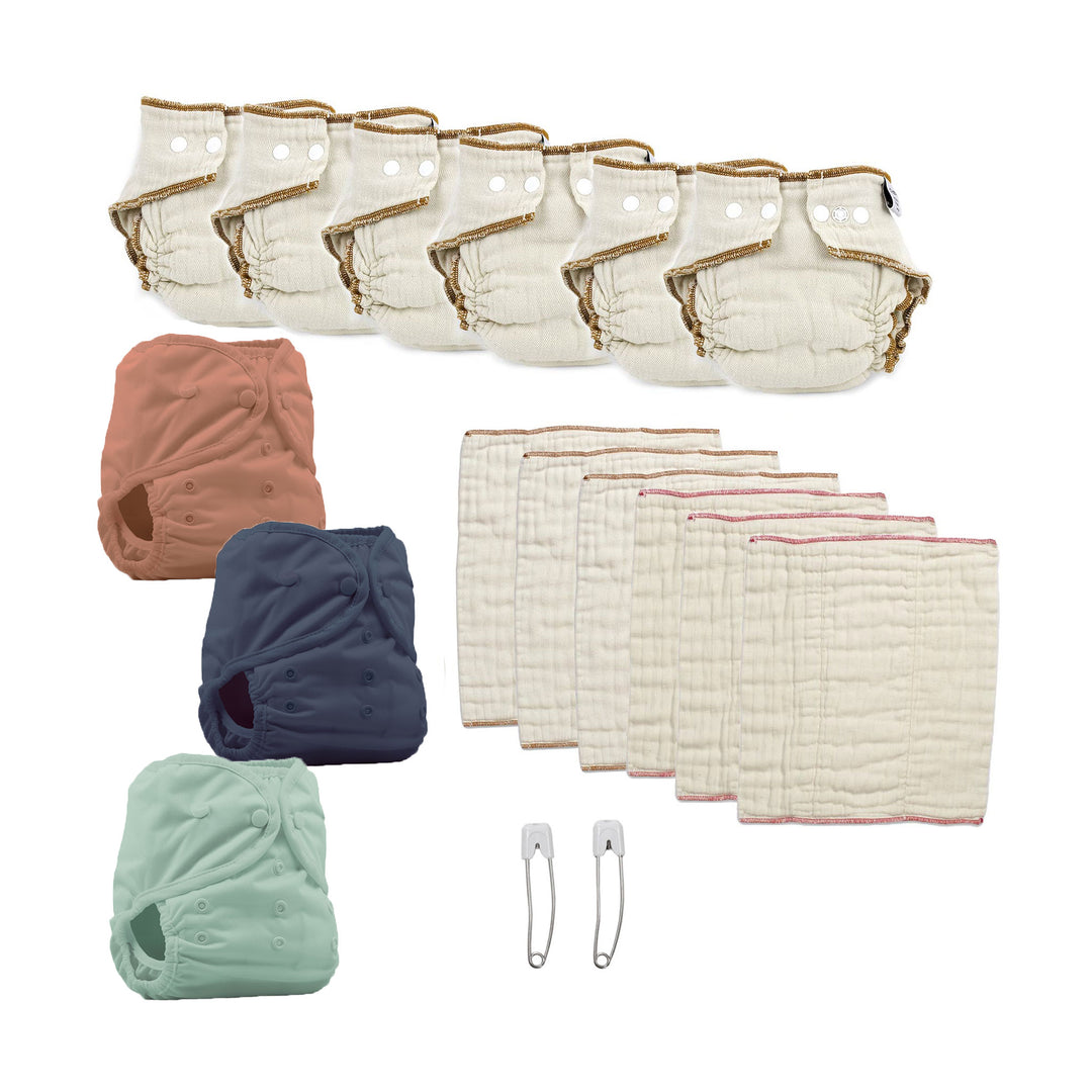 cloth diaper kit for a toddler clay navy jade solid diaper covers with two sizes of prefolds and fitted diapers