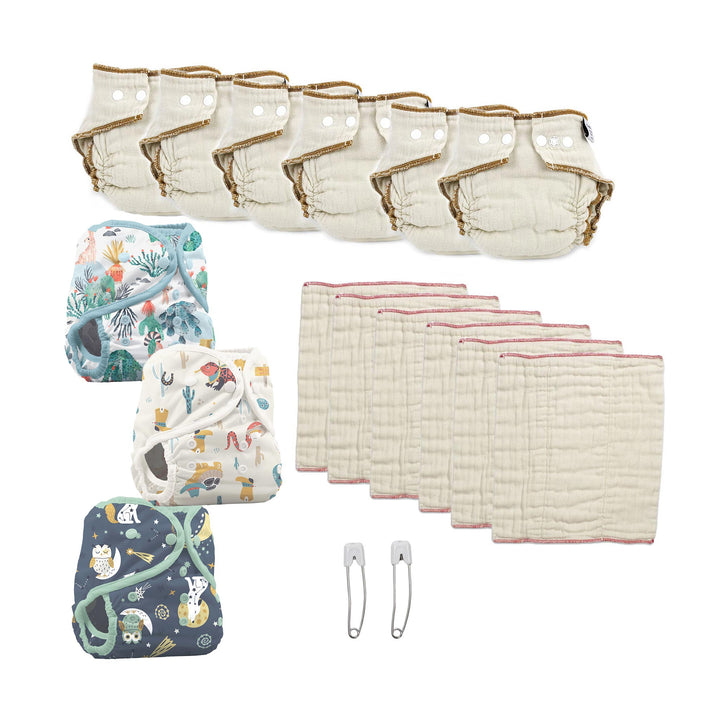 Kit try both kinds prefolds and fitted Workhorse cloth diapers and 3 diaper covers Desert Dunes, hoot and howl and Reptile Wranglers medium prefolds