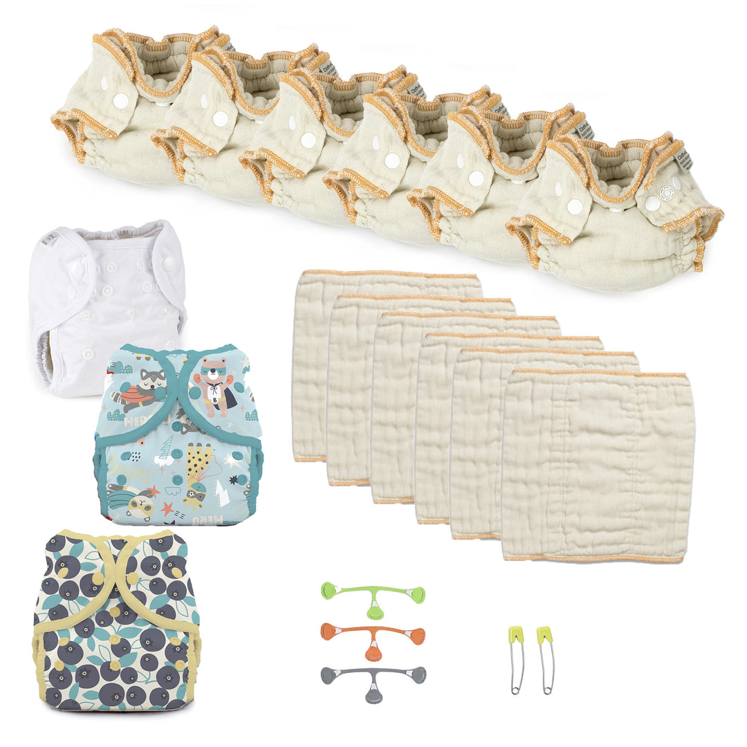 Baby cloth diaper set with diapers, cover, and accessories on a white background blueberry