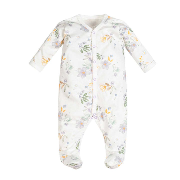 A baby footed sleeper in white with a delicate pastel floral print in purple, yellow, and green, featuring a snap-button front closure.