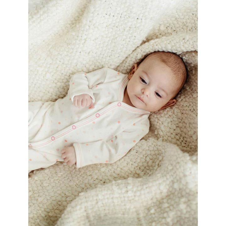 Baby in organic cotton sleeper
