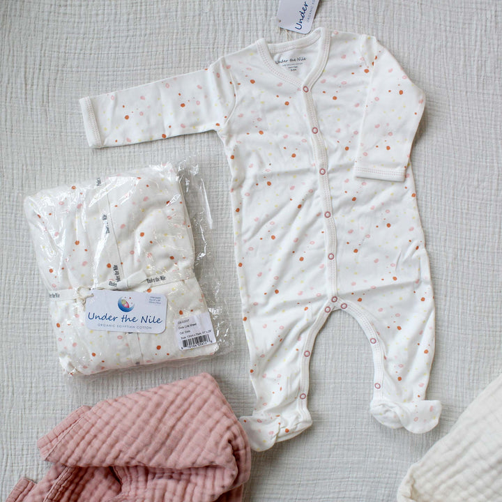 colors of under the nile pink dots organic cotton crib sheet and pajamas