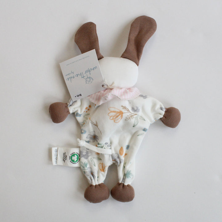 Organic baby toy puppy with tail floral pattern and brown legs on a white background