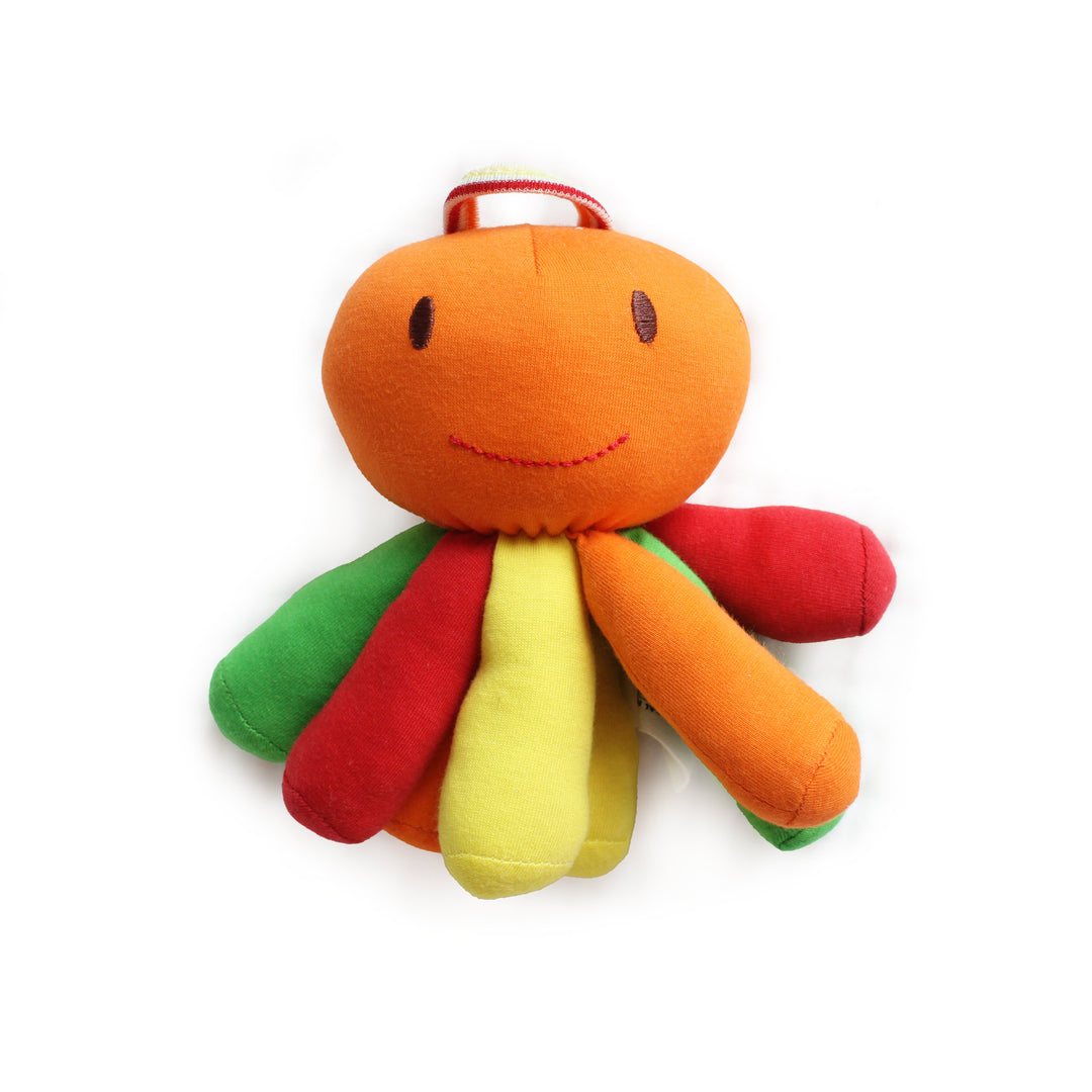 A colorful octopus-shaped plush baby toy with a bright orange head, embroidered smile, and six soft fabric tentacles in green, red, yellow, orange, and light blue, shown on a plain white background.
