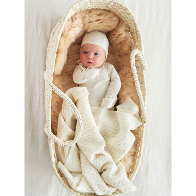 Baby in a wool Ruskovilla blanket